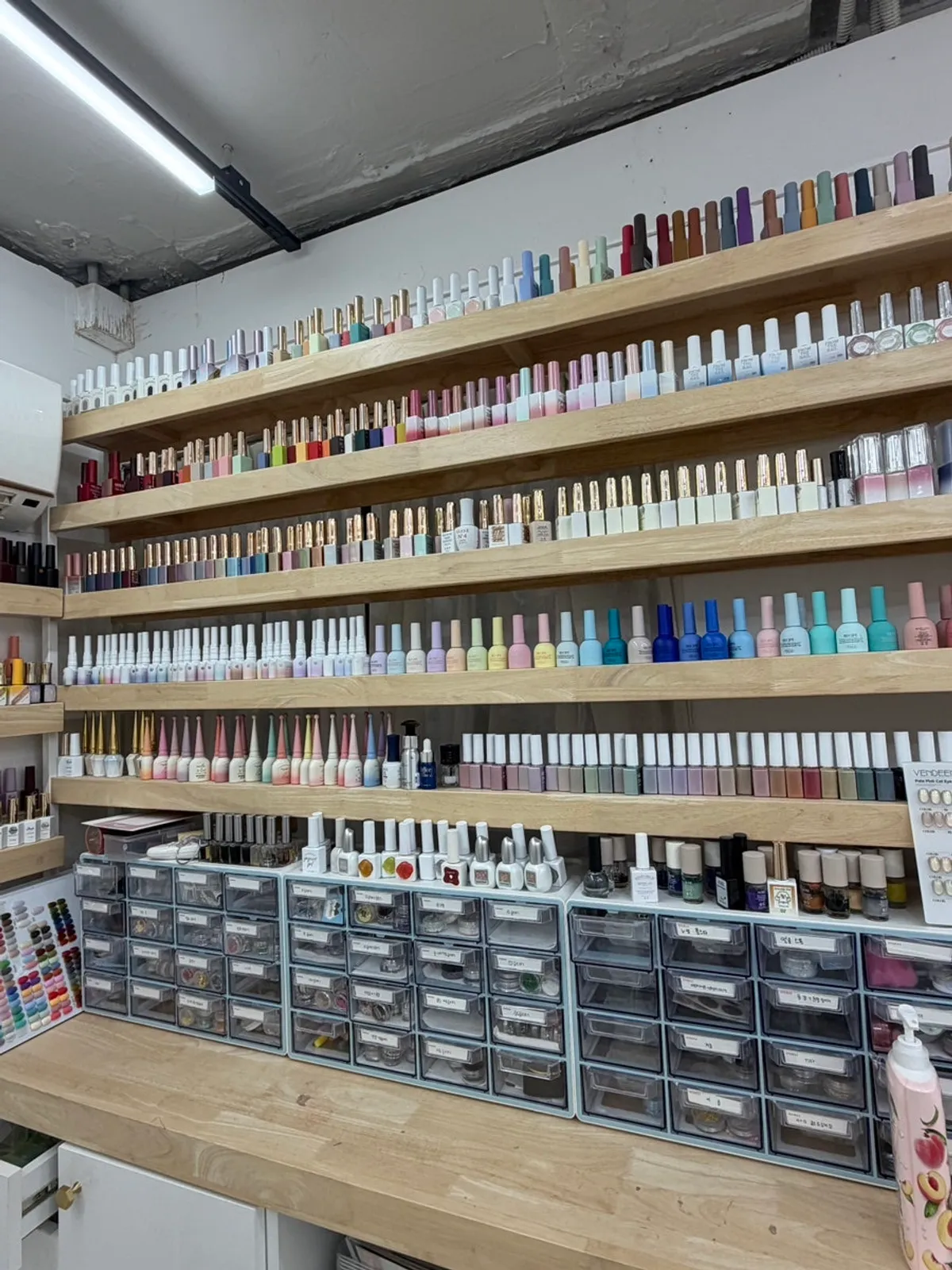 Wall filled with gel nail color display