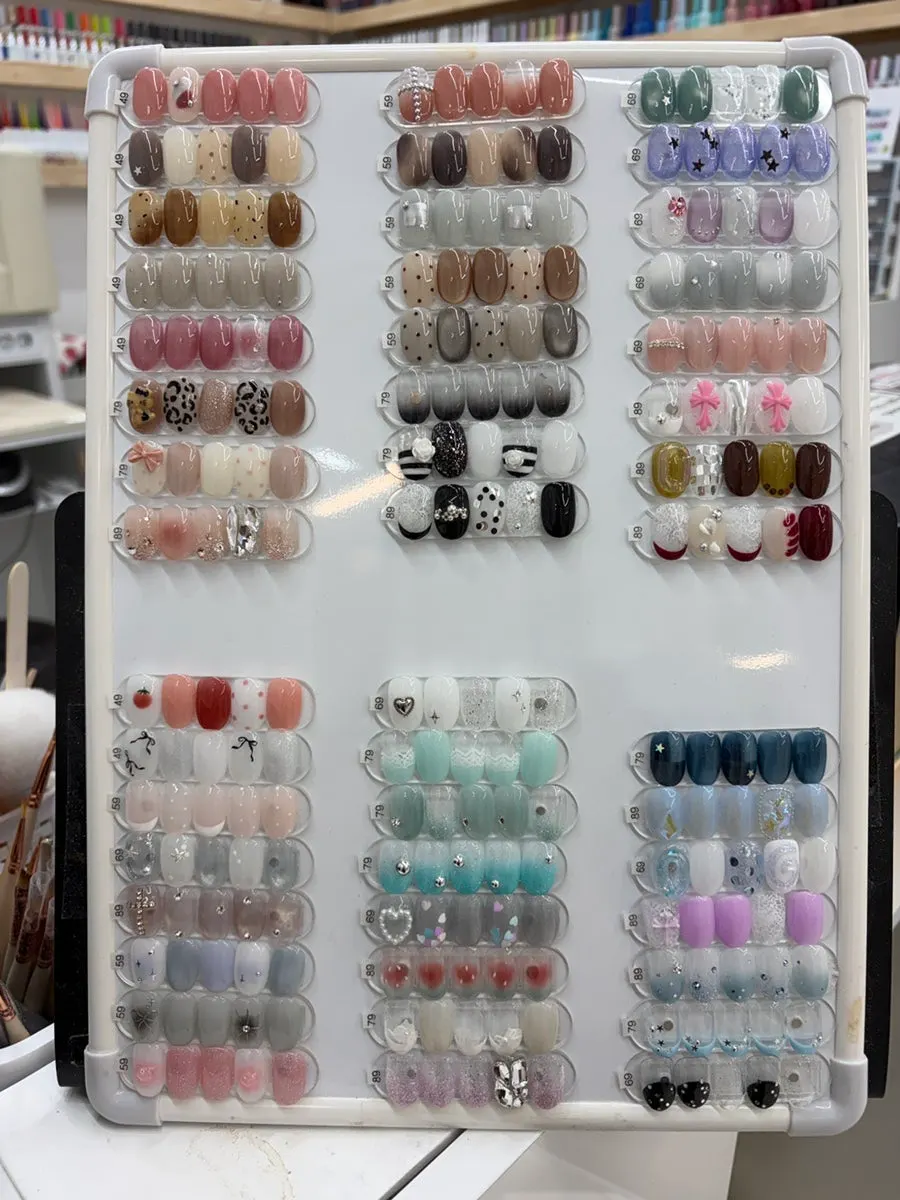 Sample nail tips with ribbons and hearts