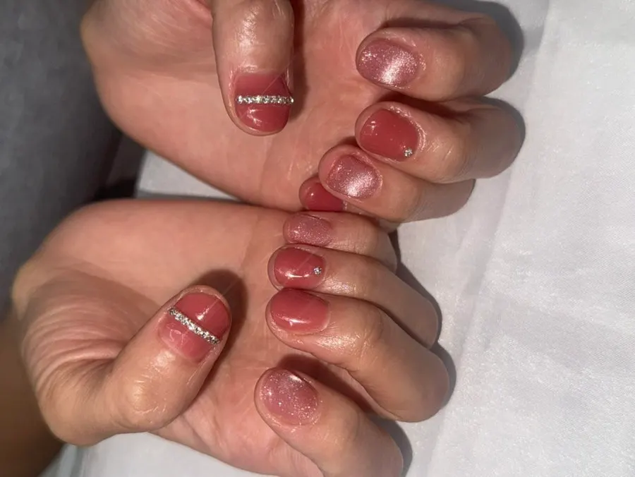 Autumn pink nails with glitter and cubic accents