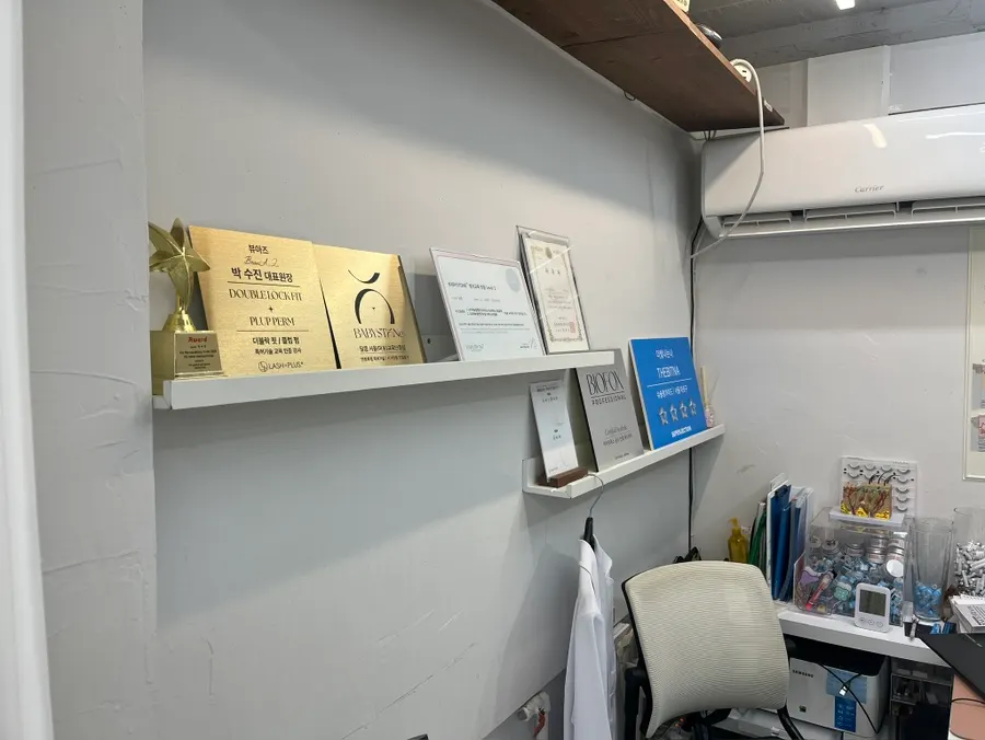 Space with beds set up for lash and skincare treatments