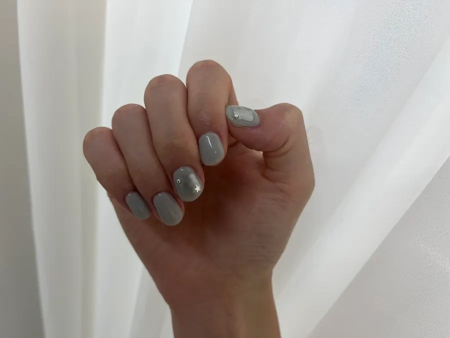 Cuticle removal and shape trimming in progress