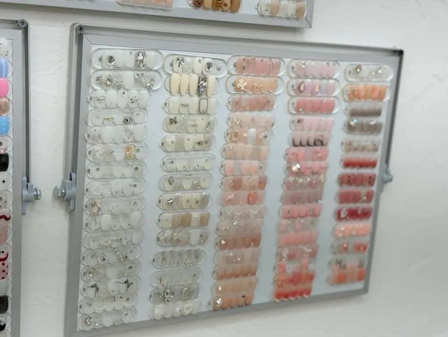 Screen showing Monthly Art design options at the Hongdae nail salon