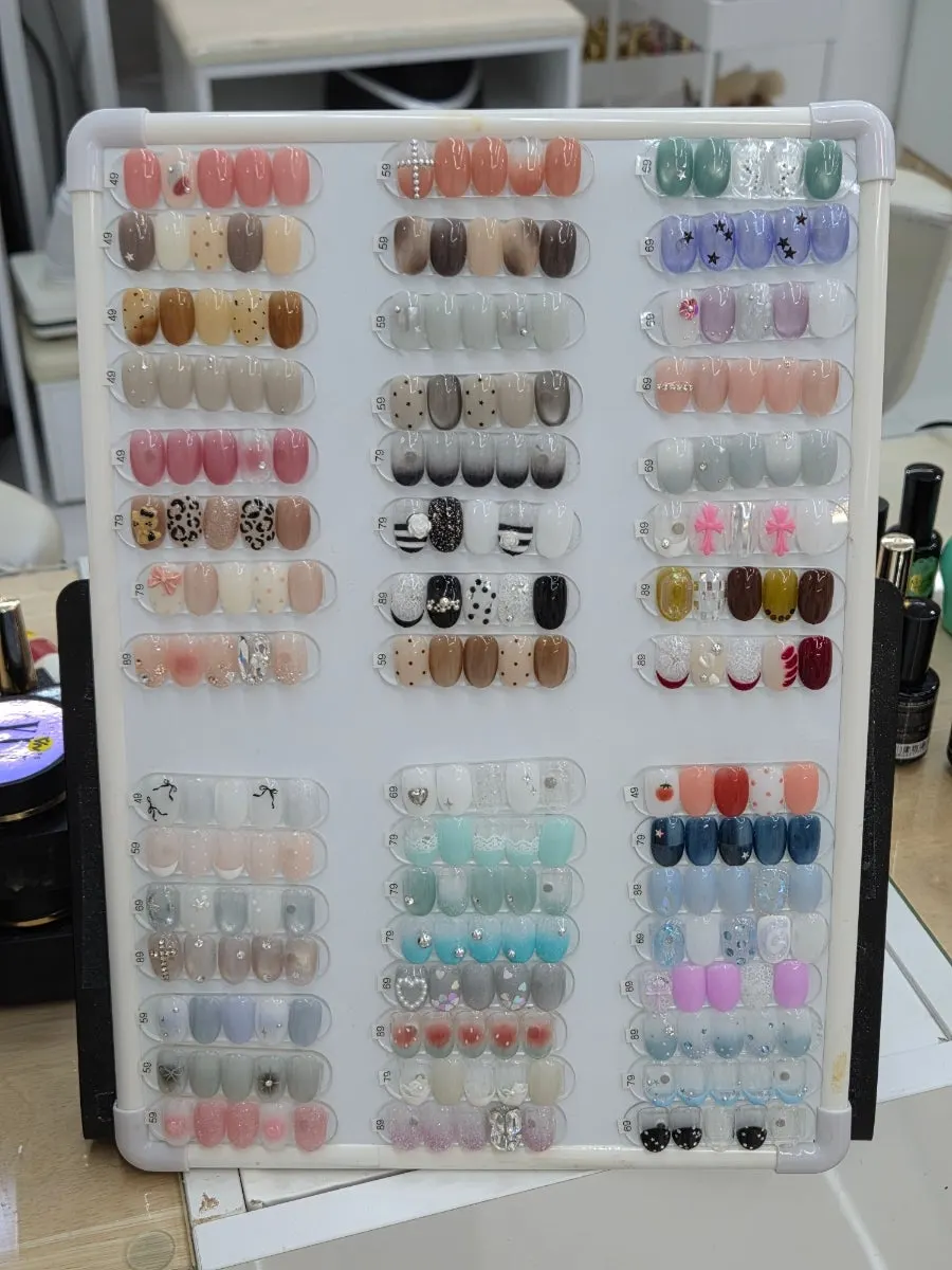 A display stand of nail design samples to choose from in person