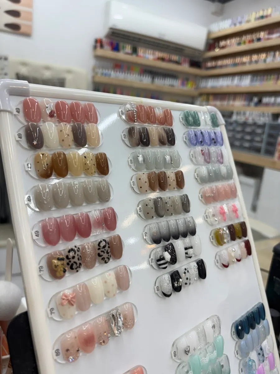 Monthly art nails finished with part stickers