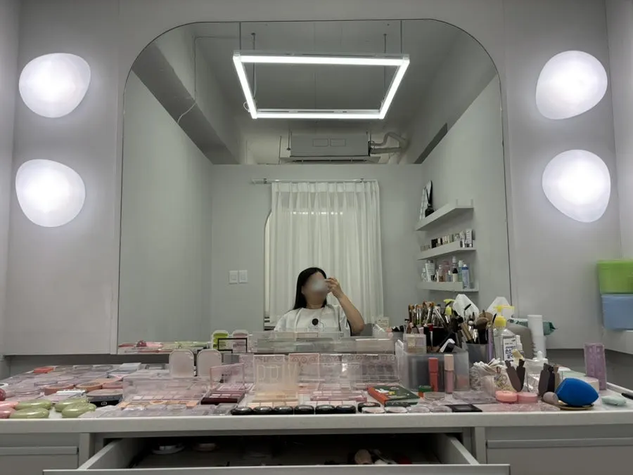 Lighting and mirror inside the private makeup room