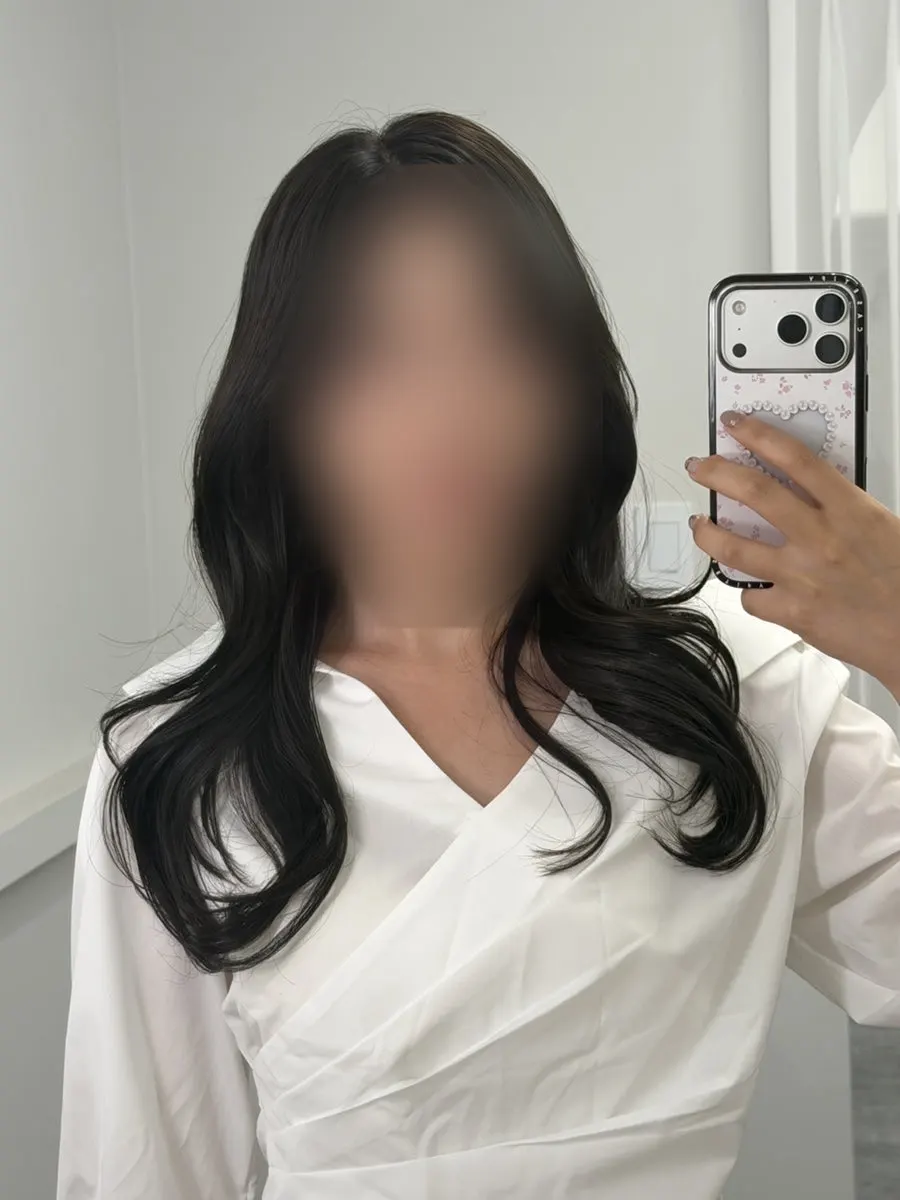 Self-shot taken after makeup without lenses