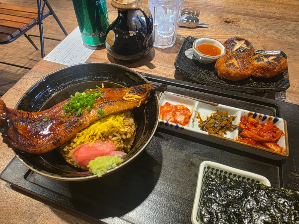 Unagi chazuke and mushroom tempura set on the table