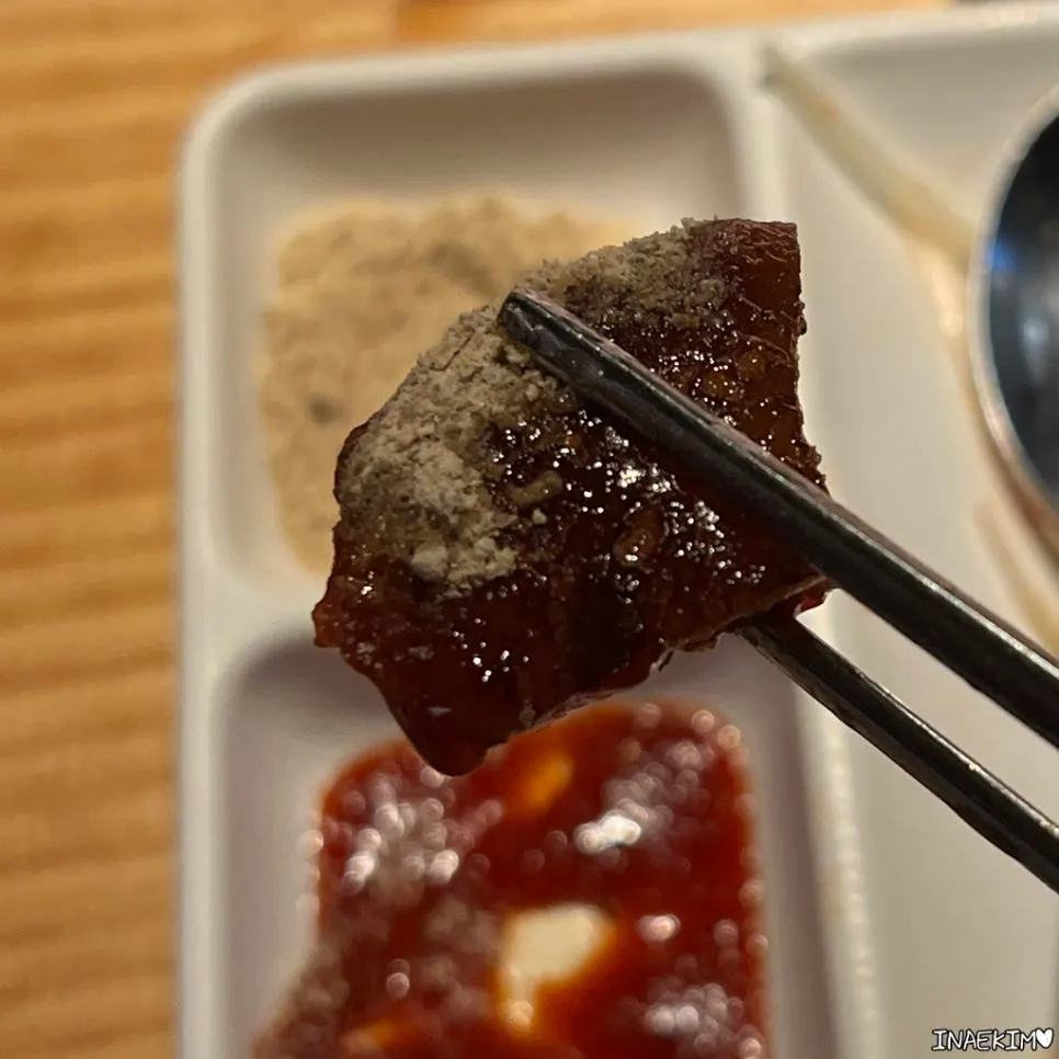 Grilled pork skin served at the table