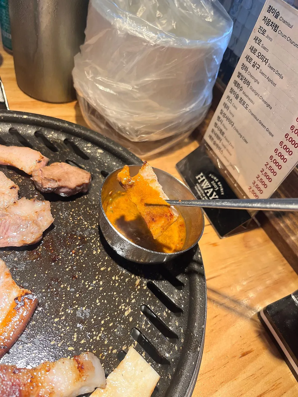 Myeolchijeot simmering on the grill