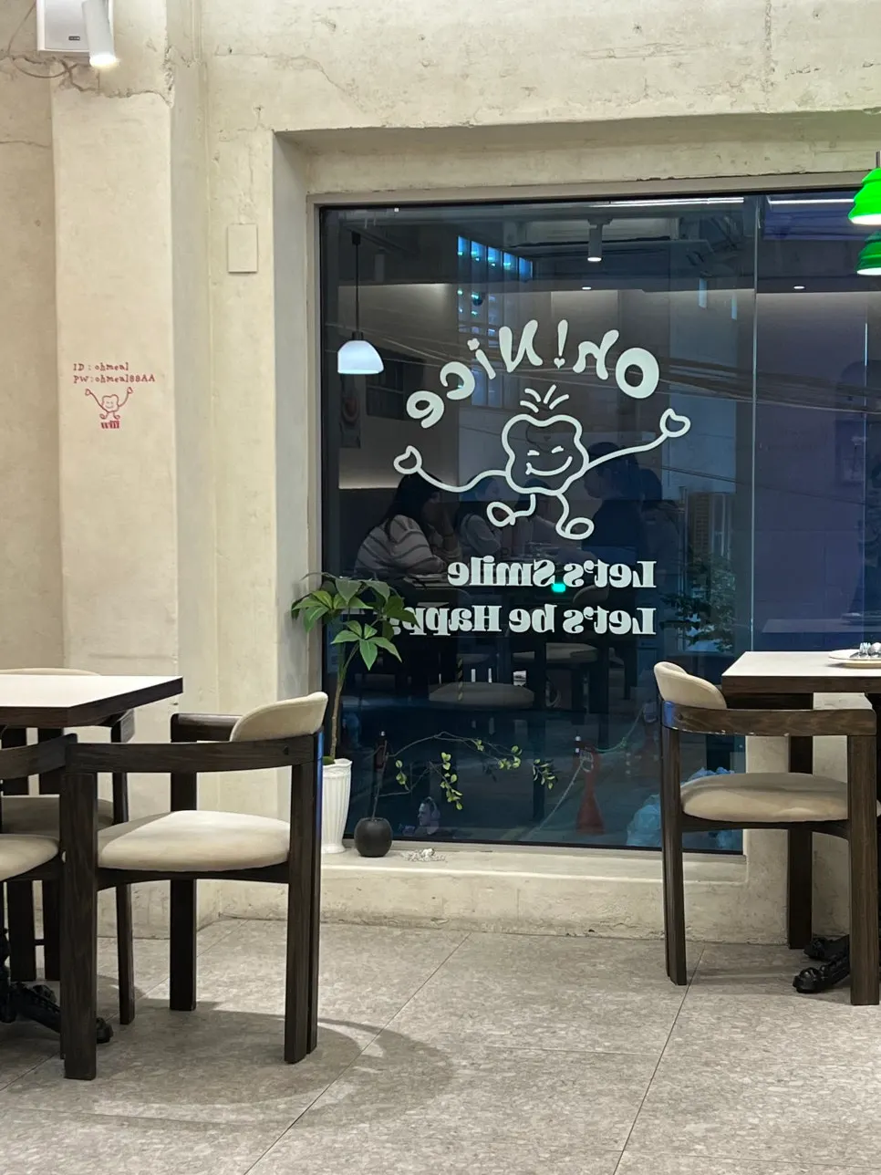 Interior of Omil Hongdae with large 2nd-floor windows