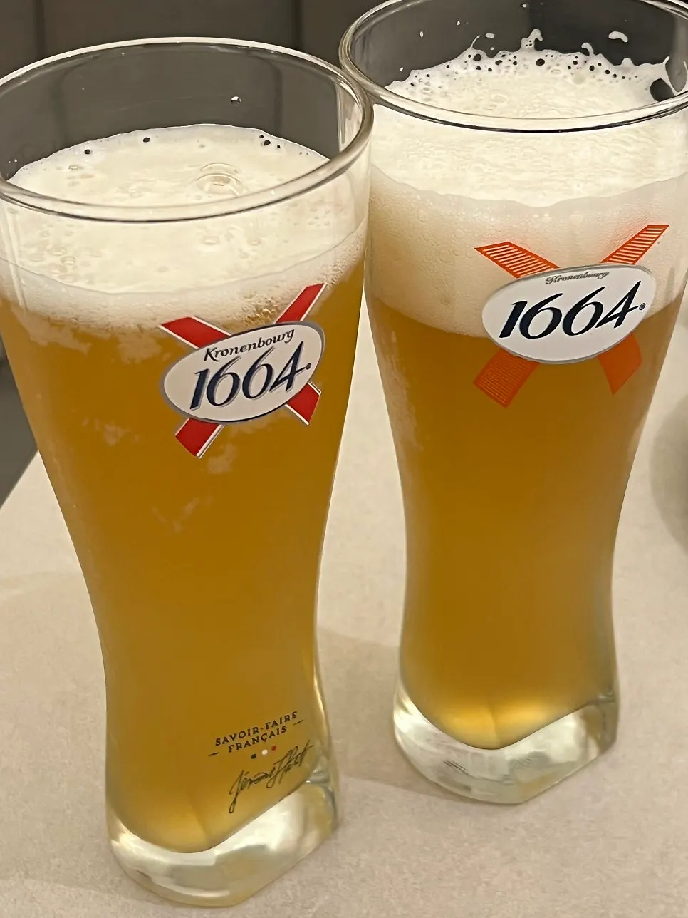 1664 Blanc beer poured into a glass