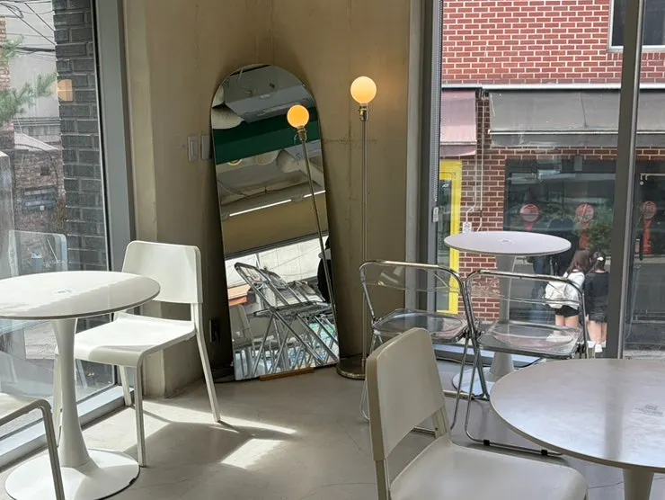 Café interior with generously spaced tables