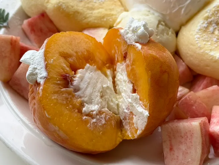 Cross-section of peach and soft soufflé