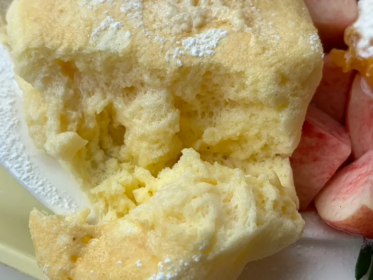 Cross-section of a peach filled with Greek yogurt