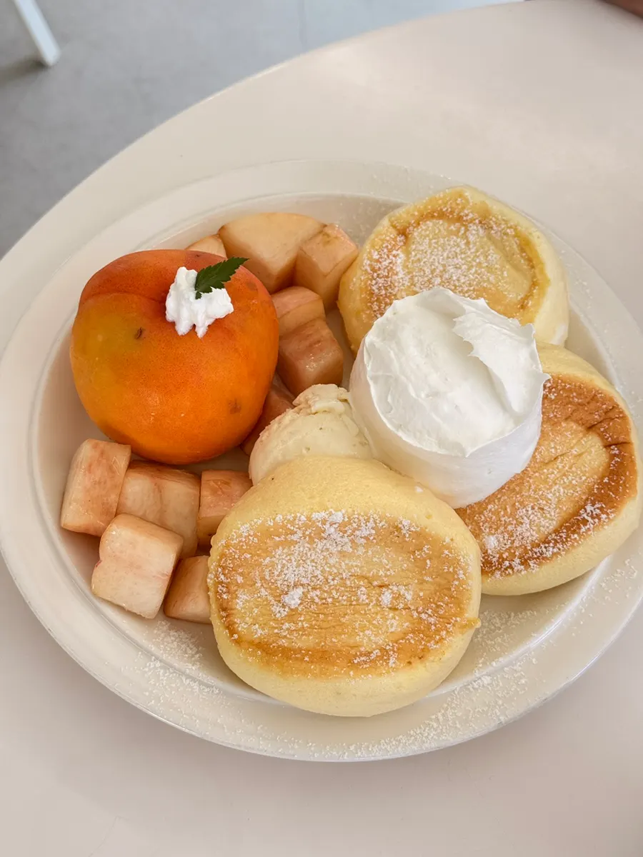 Warm soufflé with whipped cream after the 20-minute wait