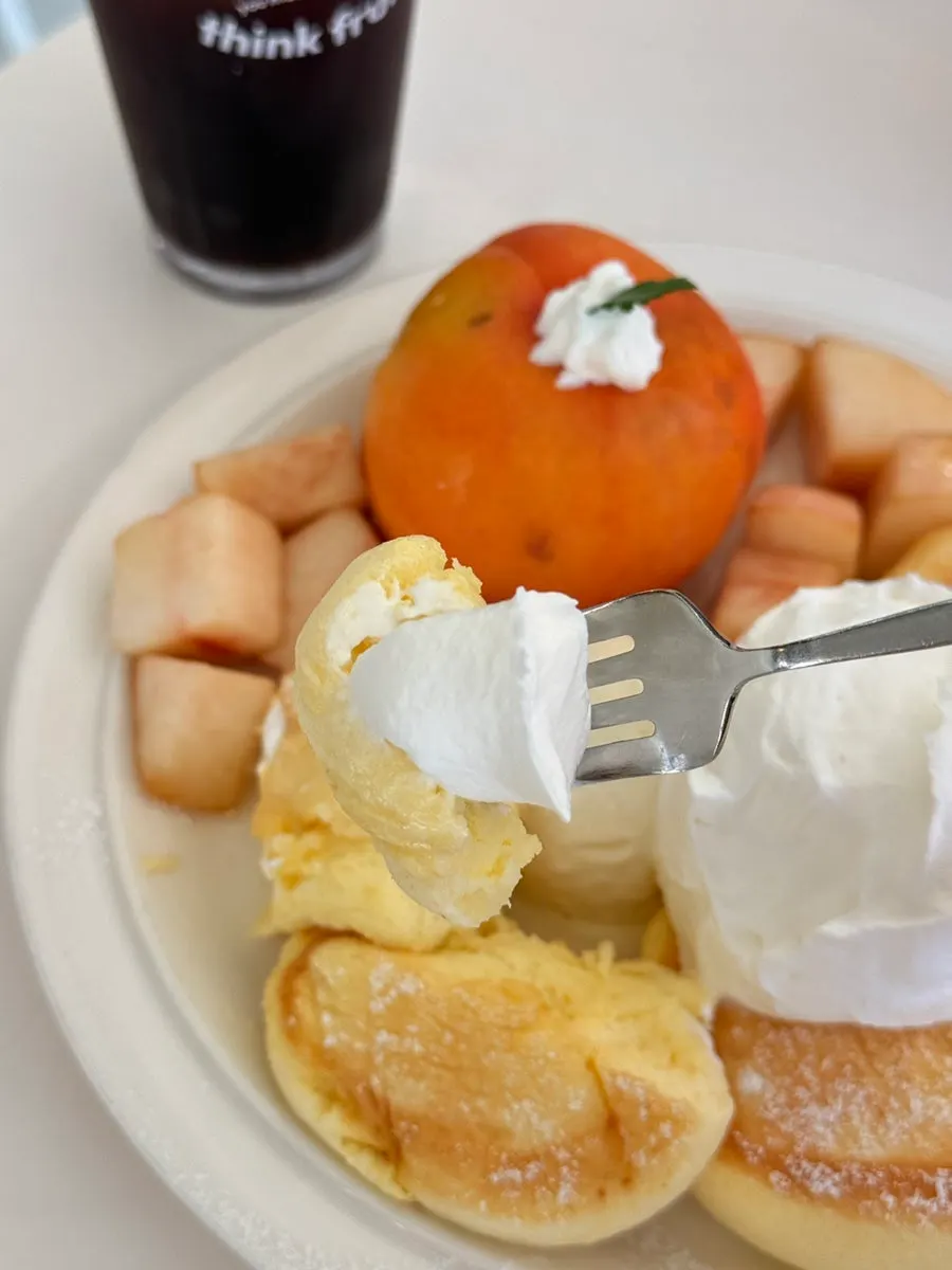 Moist soufflé topped with peach