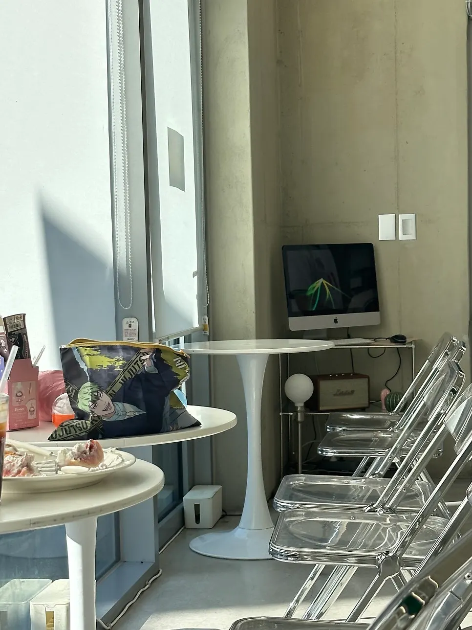 Bright window-side table at Think Fruit