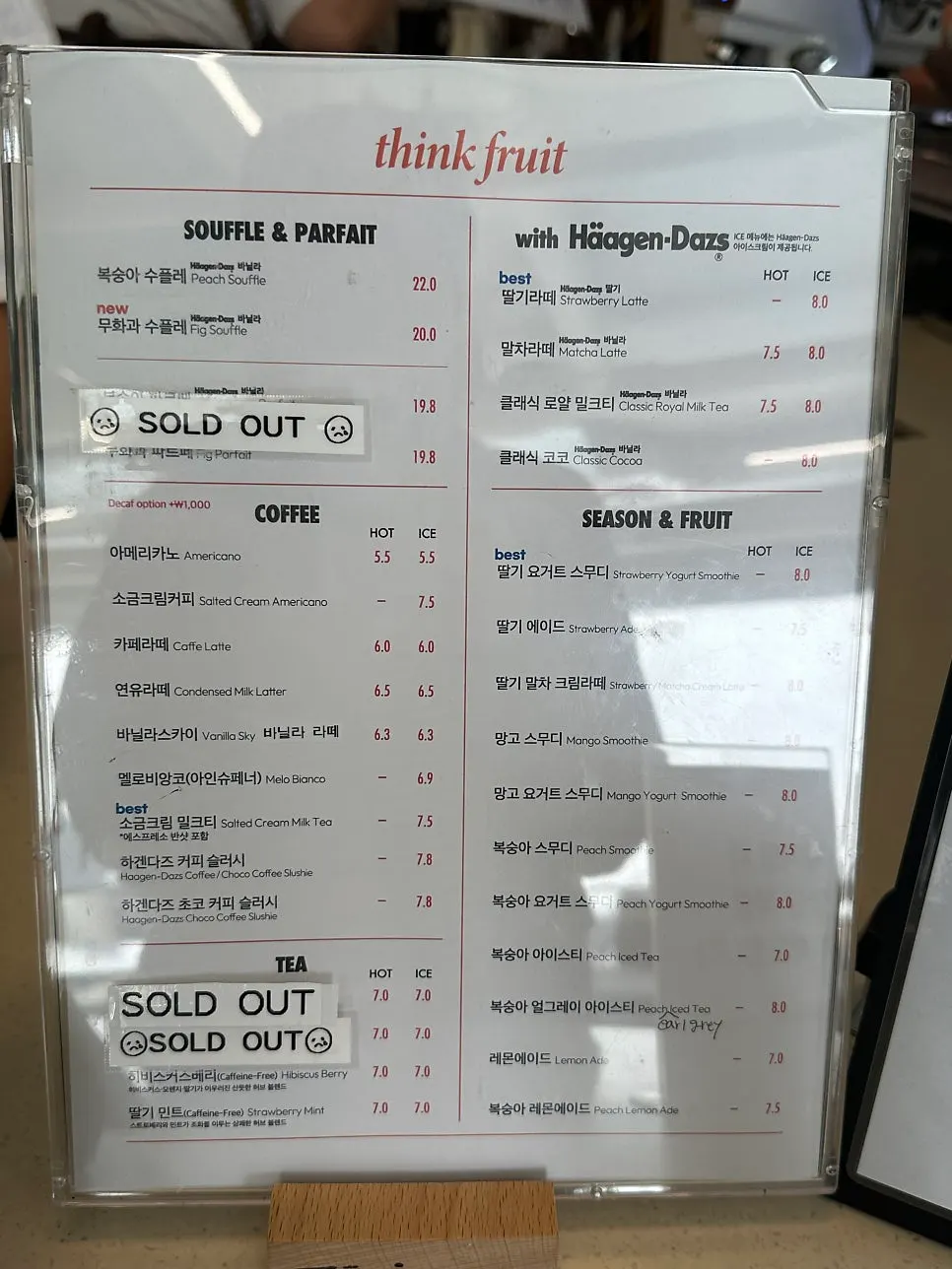 Menu listing seasonal fruit items at Think Fruit