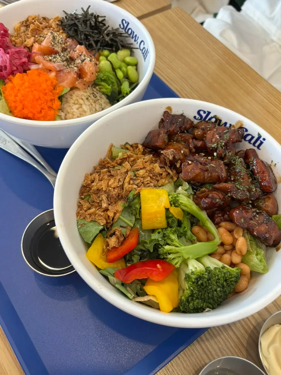 Salmon poke and chicken bowl meal
