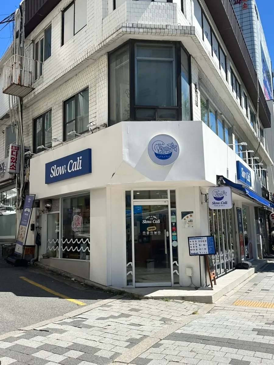 Slow Cali storefront on the main road near Hongik University Station