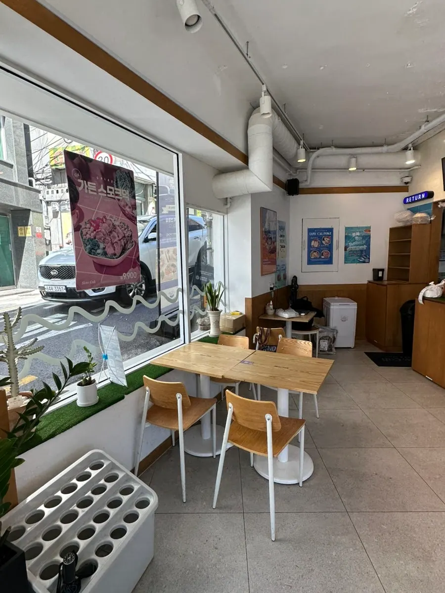 Bright seating area inside Slow Cali