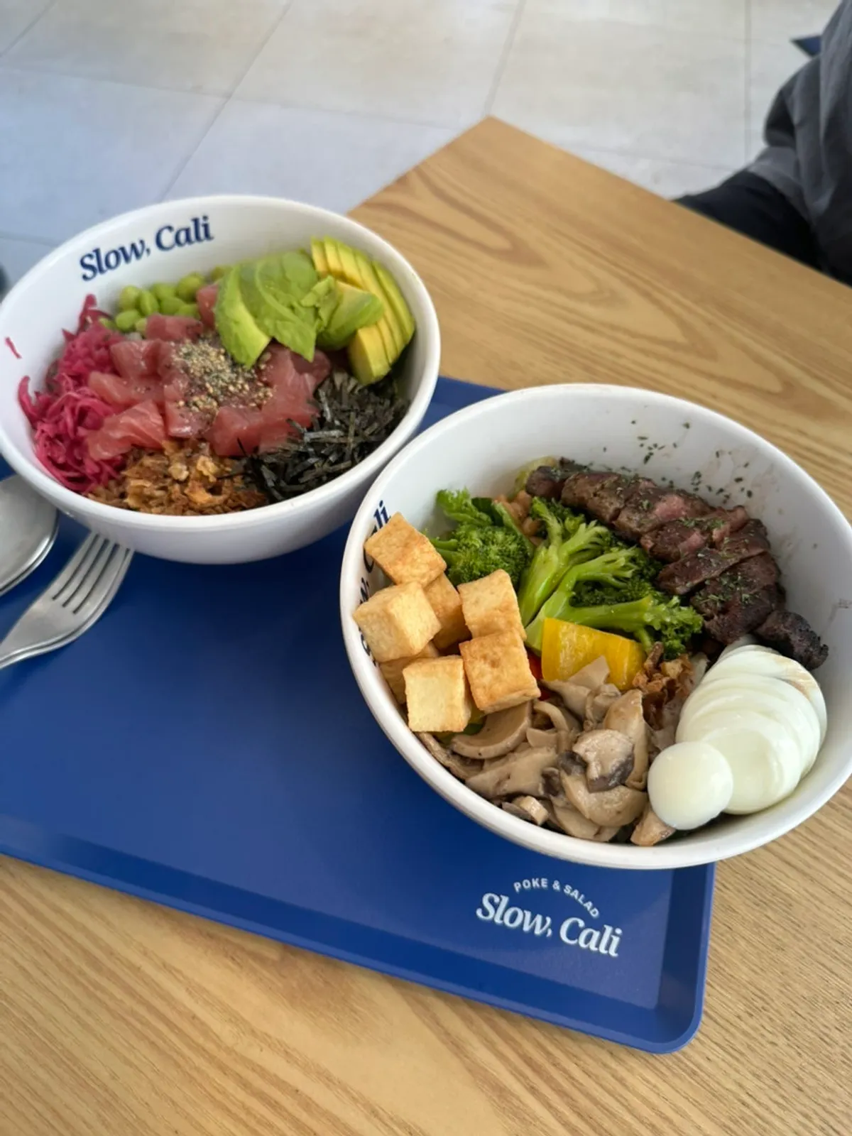 Tuna poke and skirt steak bowl set together
