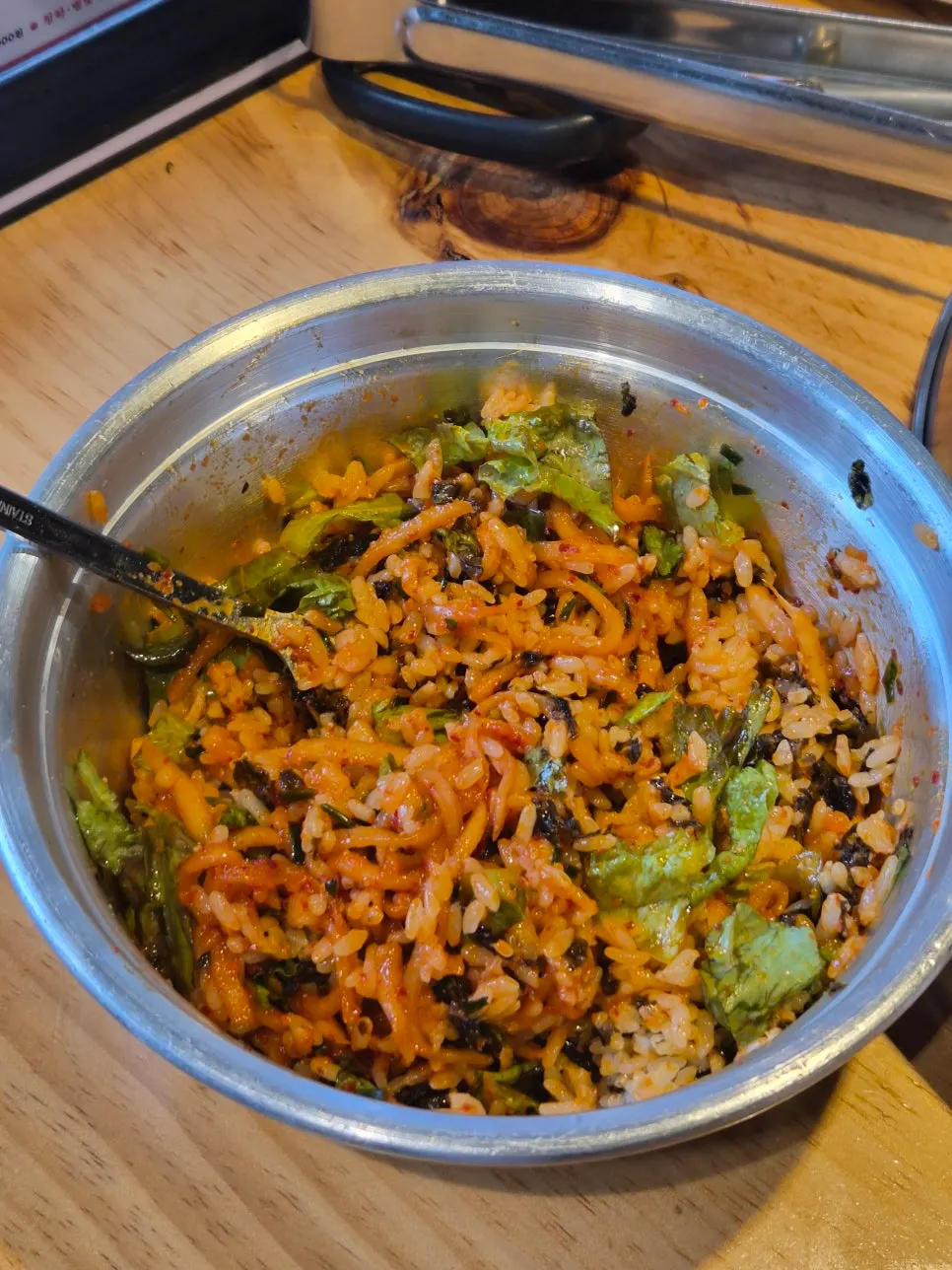 Mu-saengchae daecheopbap mixed together with a spoon
