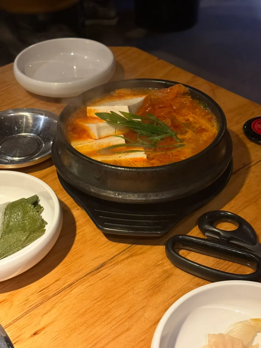 Chondwaeji kimchi jjigae with big chunks of meat