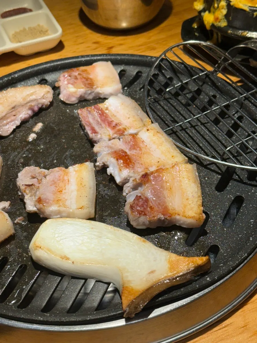 Table with meat and egg custard together