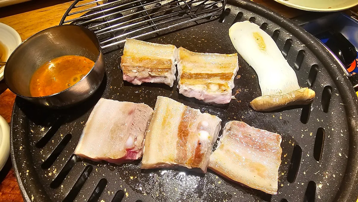 Pork belly and mushroom grilling on the pan