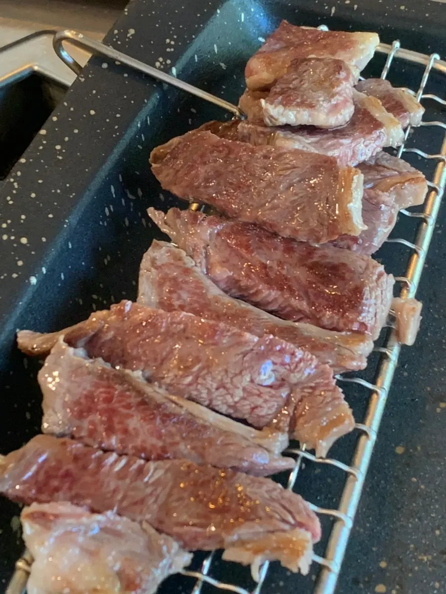 Juicy sirloin finished on the grill by staff