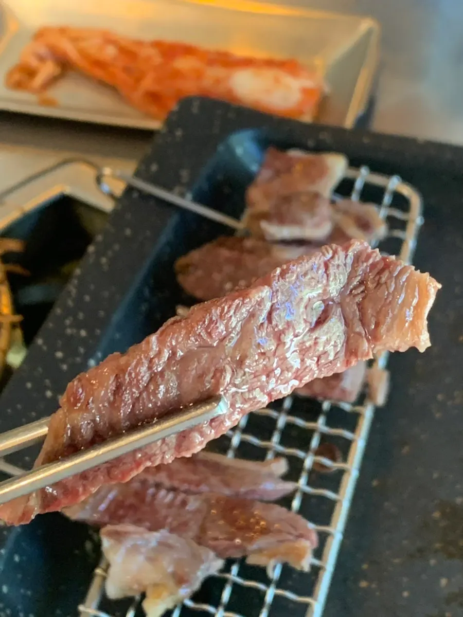 Dining scene with a toast of beef