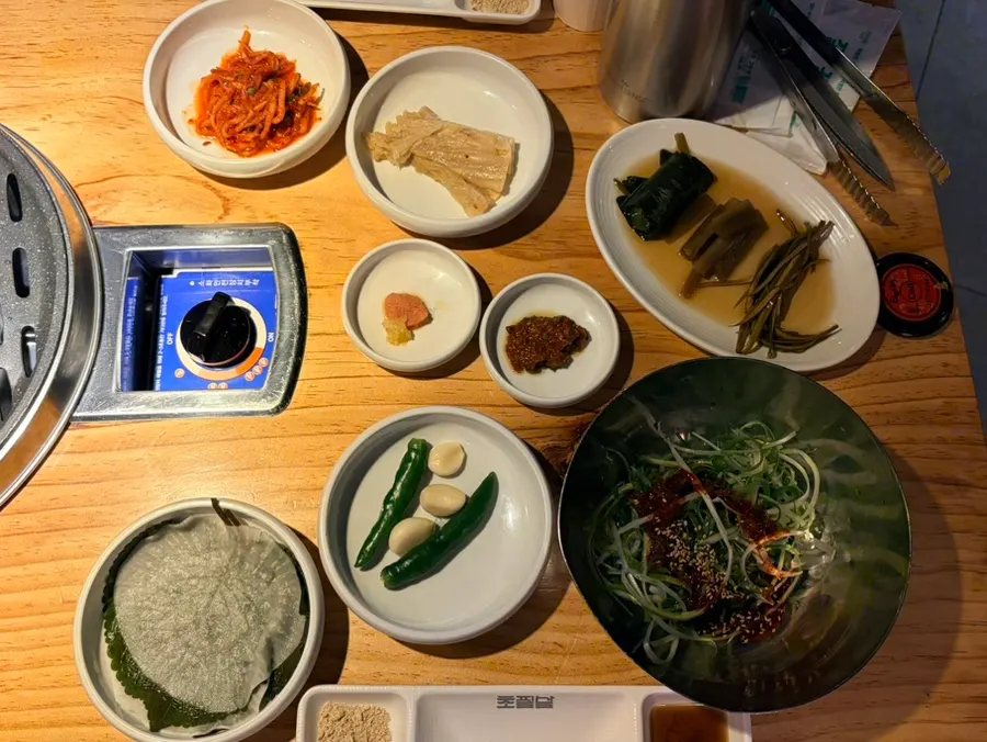 Side dish setting with pork skin sauce and salt for the meat