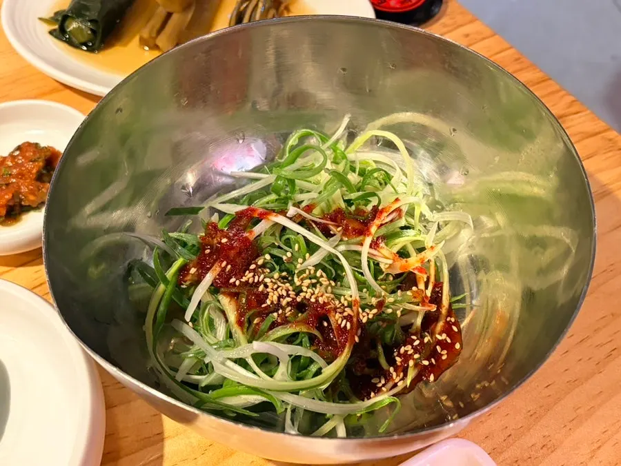 Scallion salad and pickled sides like myeongi namul
