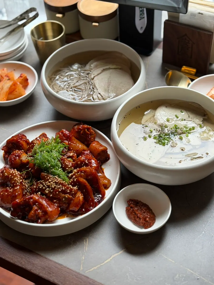 Pyongyang naengmyeon enjoyed at a window table for two
