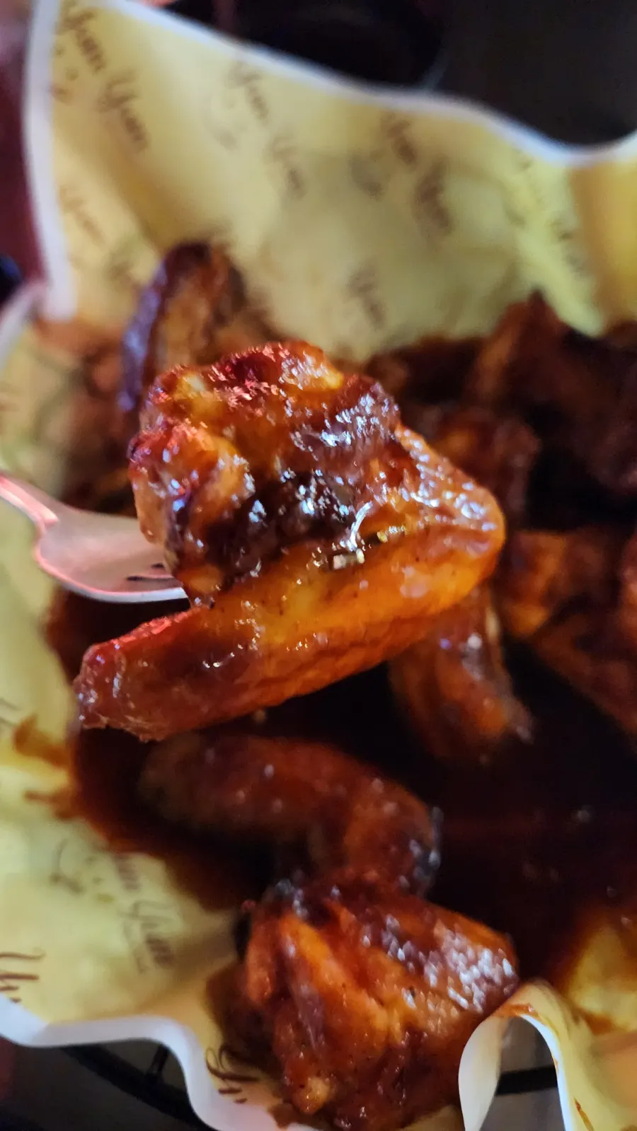 A spicy-sauced piece of Volcano oven-roasted chicken