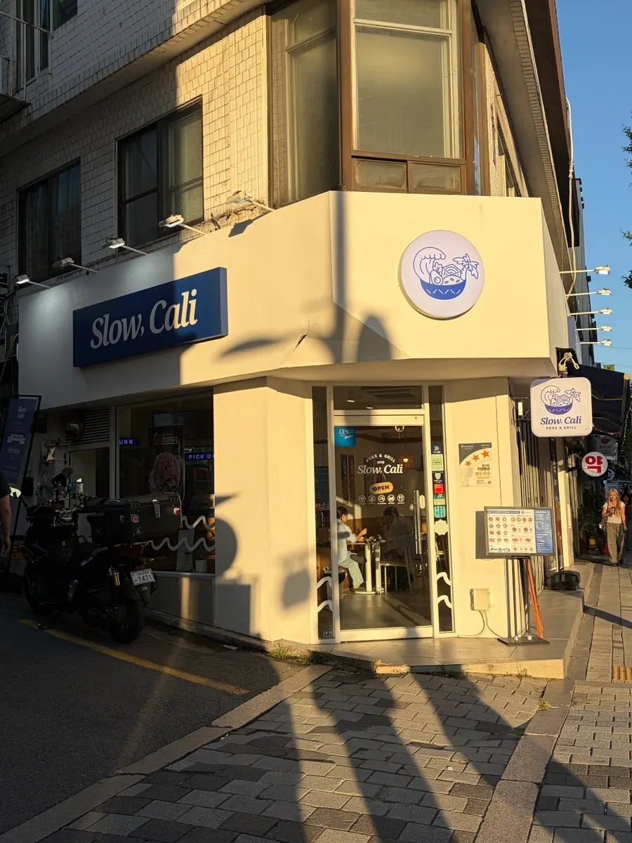 Exterior of Slow Cali Hongdae Entrance Station Branch on a corner lot