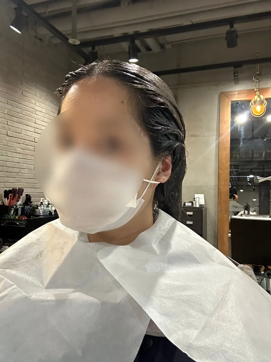 Checking the dye application carefully