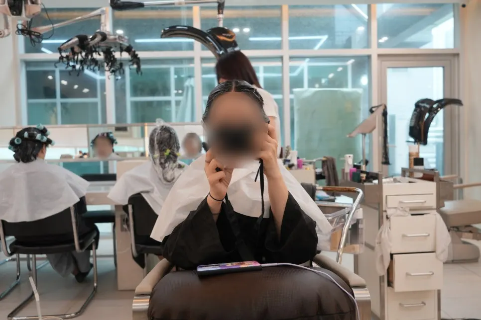 Hair with dye applied, left to process