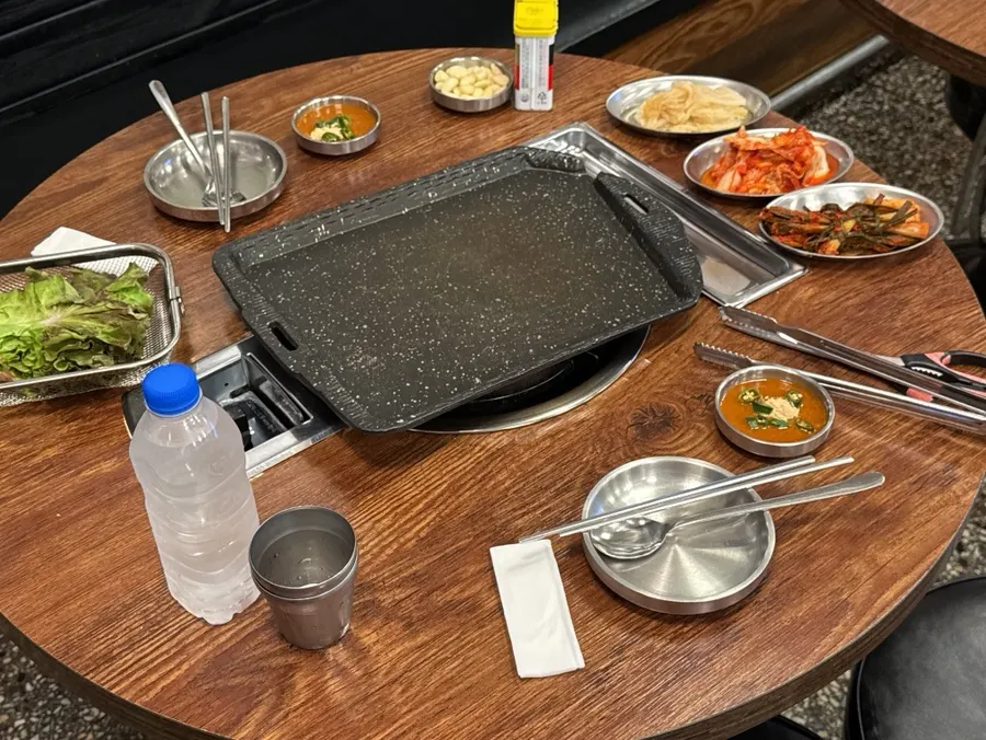 Table set with a natural stone grill plate