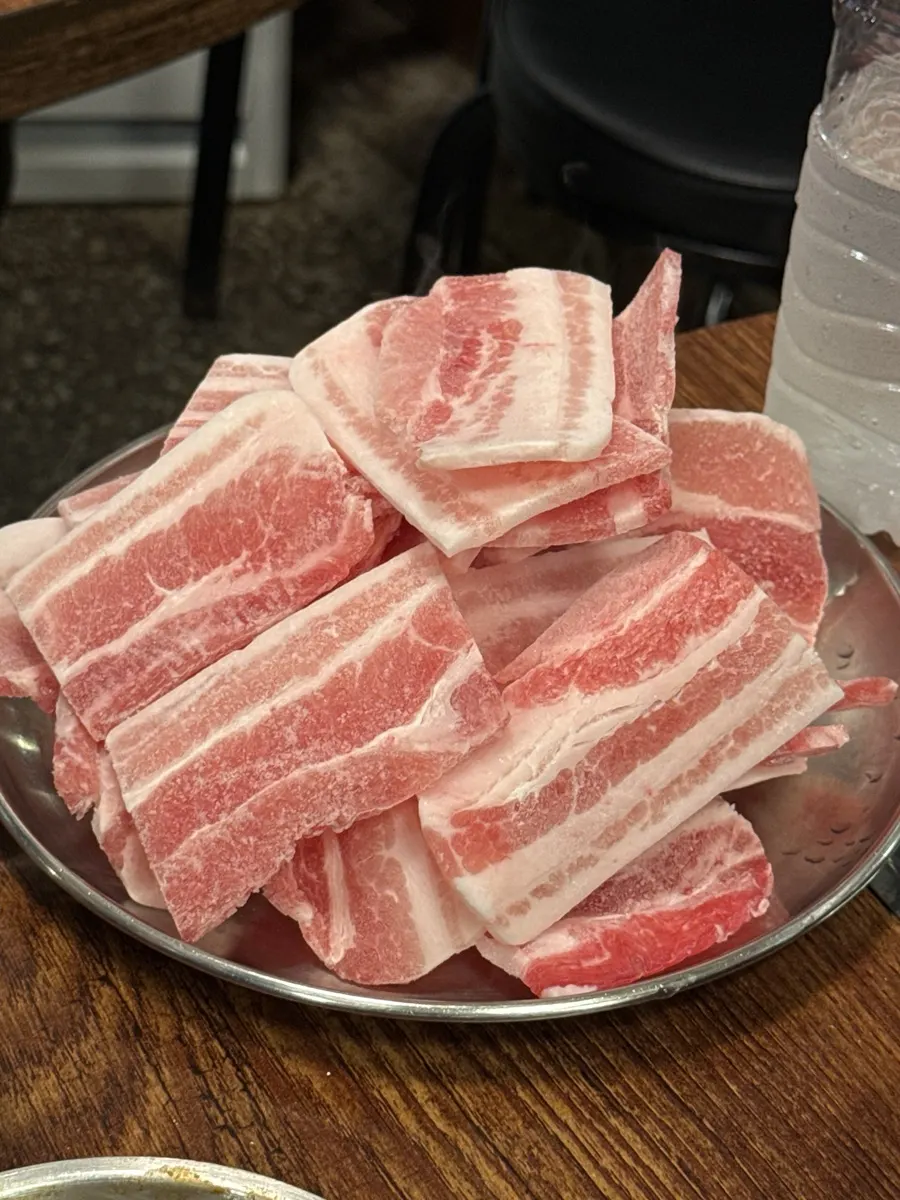 Two additional servings of frozen pork belly