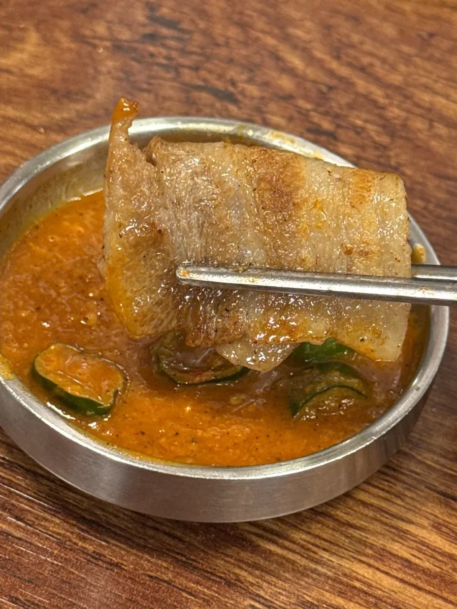 Frozen pork belly with crisped edges