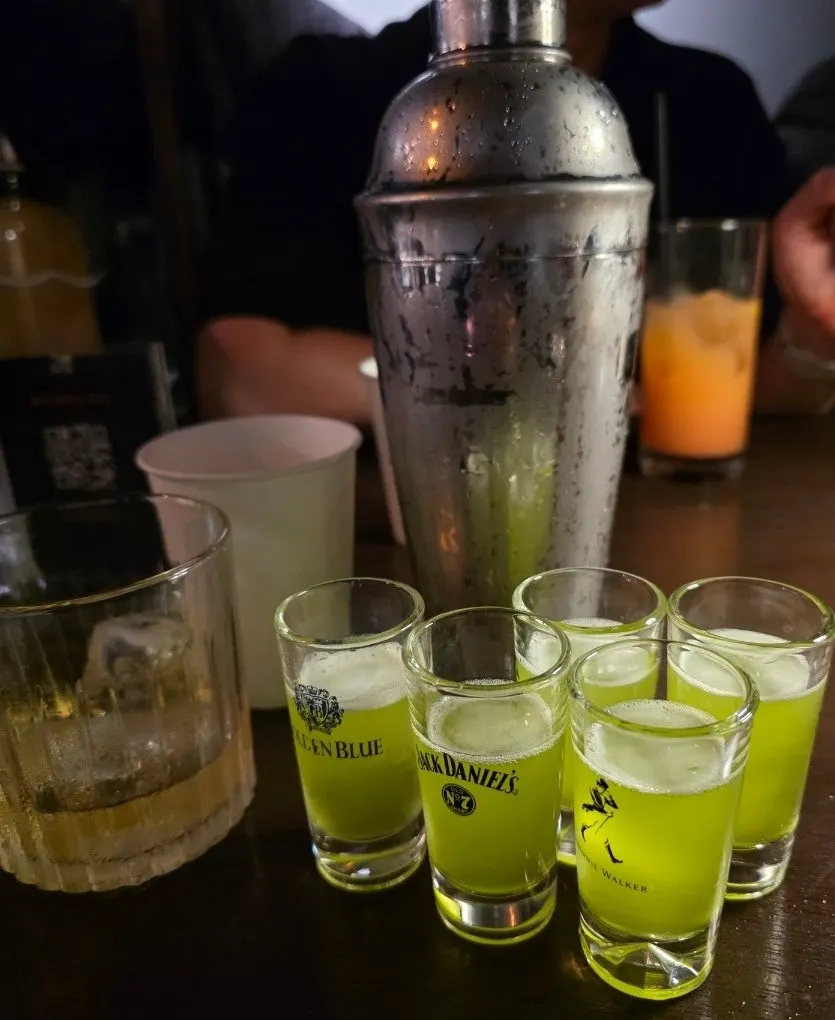 A glass of Woo Woo's signature cocktail