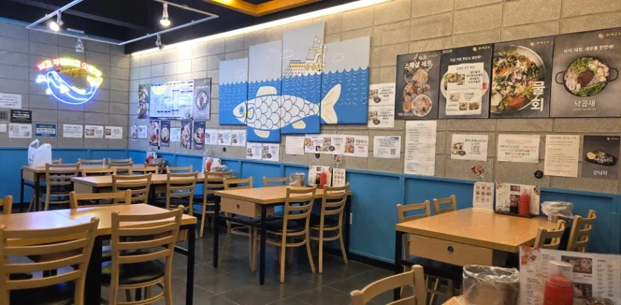 Interior hall of Eosa Chulto Hongdae Branch with fish paintings
