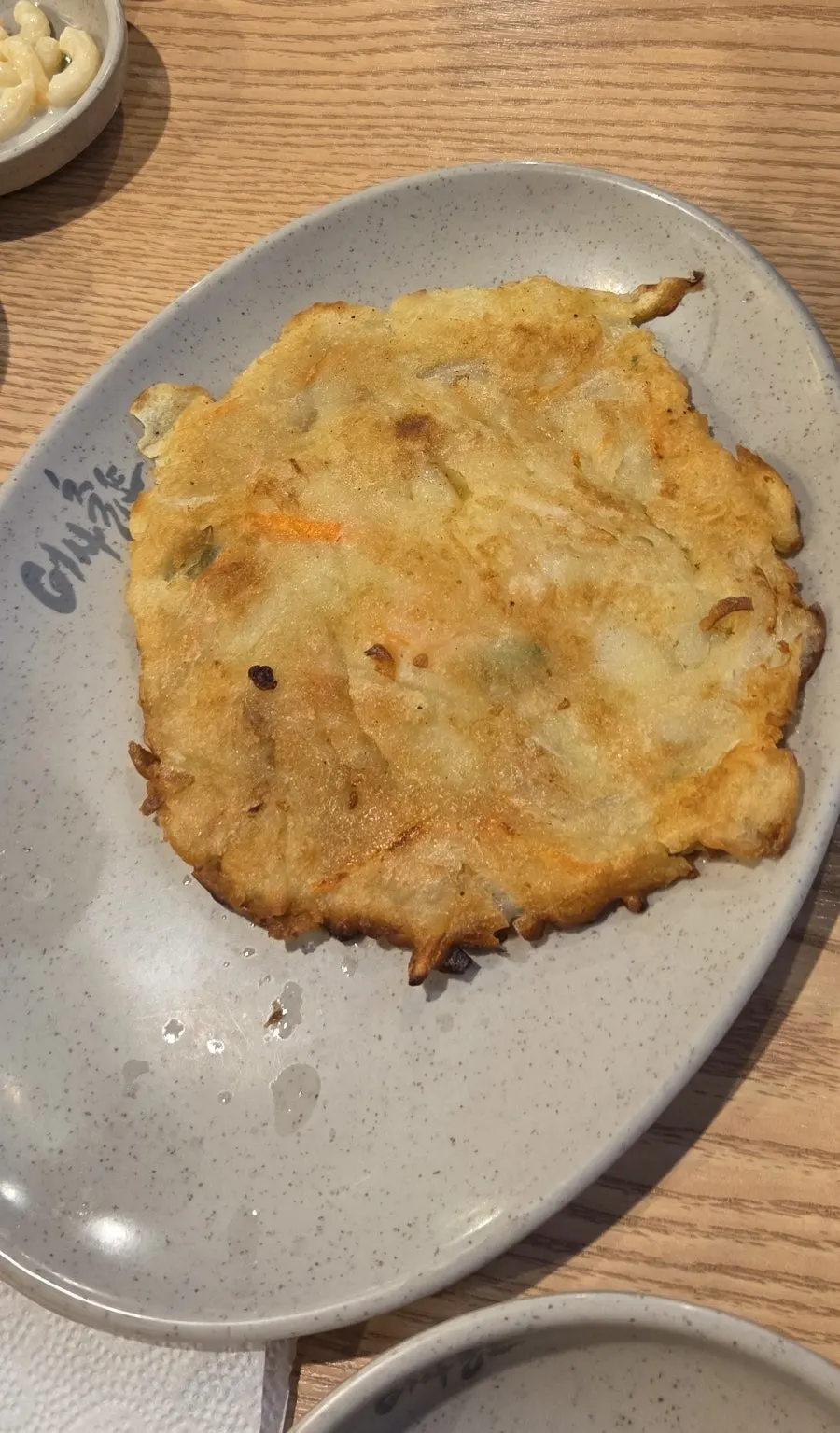 Freshly fried warm jeon pancake included in the basic spread