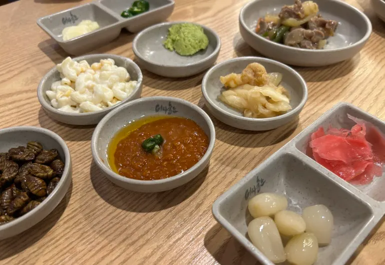 A full spread of sashimi set on the table at Eosa Chulto Hongdae Branch