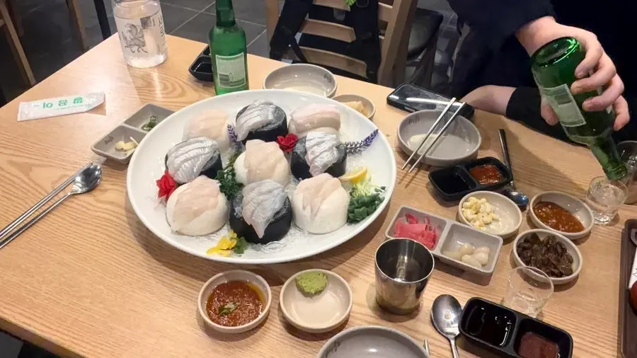 Sashimi topped with ssamjang and garlic