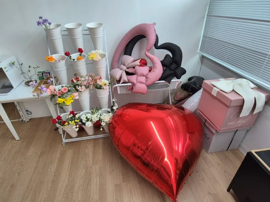 Wide shot of the studio's prop corner