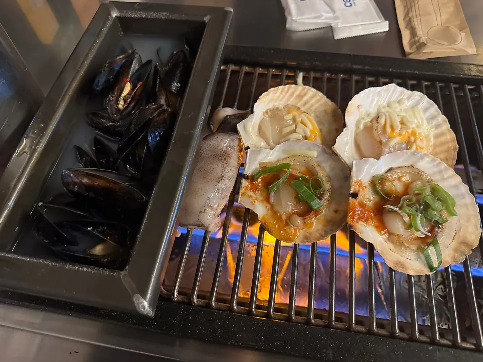 Clams and mussels on a gas grill