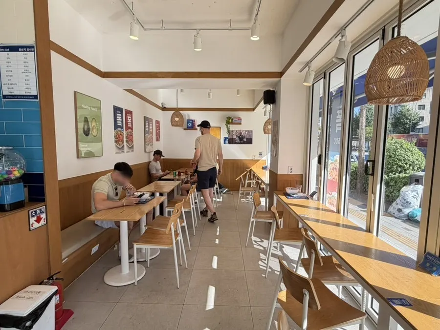 Clean, spacious interior of Slow Cali Hongdae Entrance Station Branch